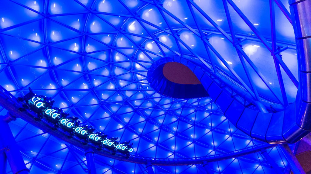 Experience futuristic thrills and glowing blue speed on the TRON Lightcycle.