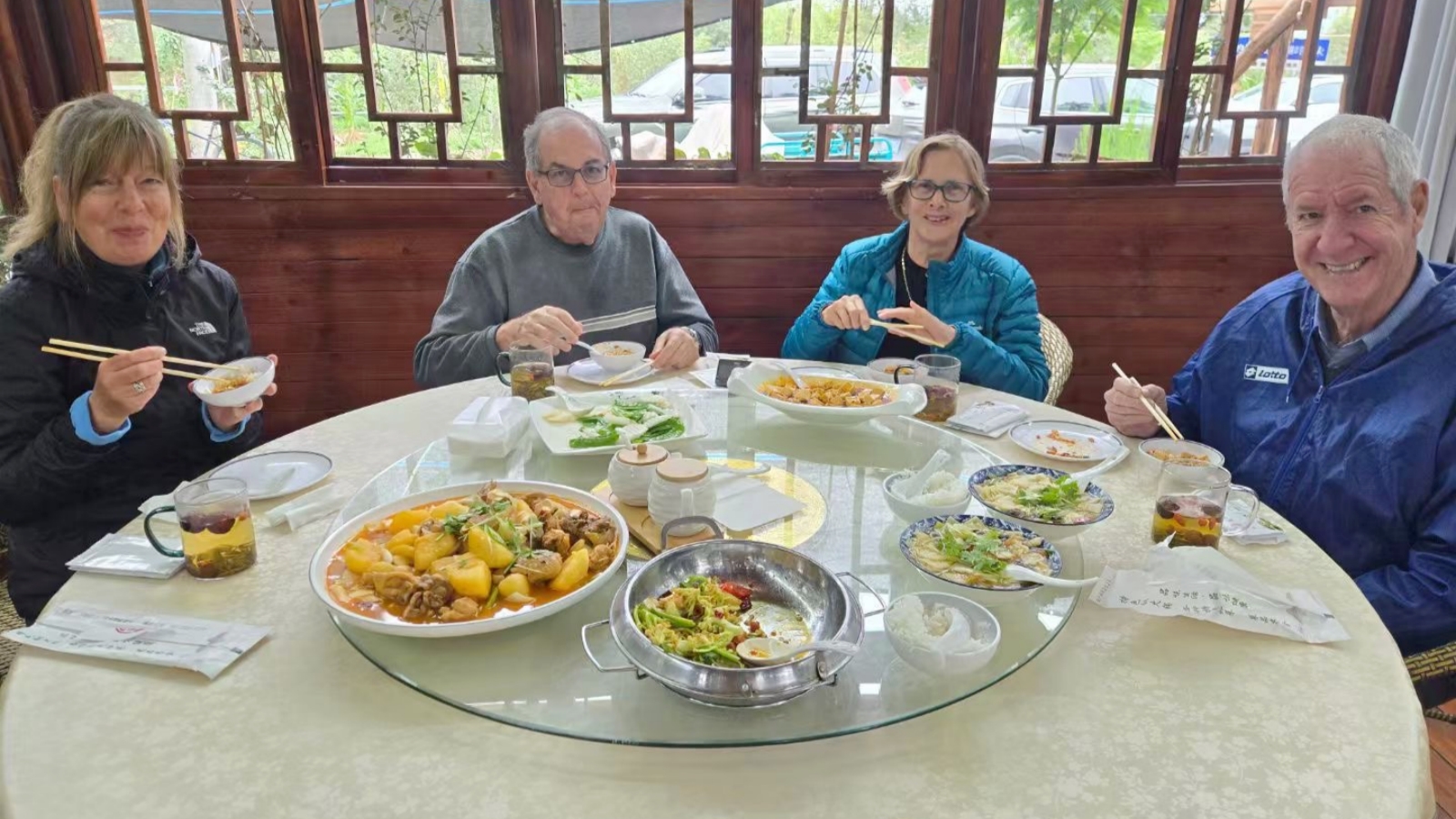 Our guests enjoy a group dining experience at a Chinese restaurant