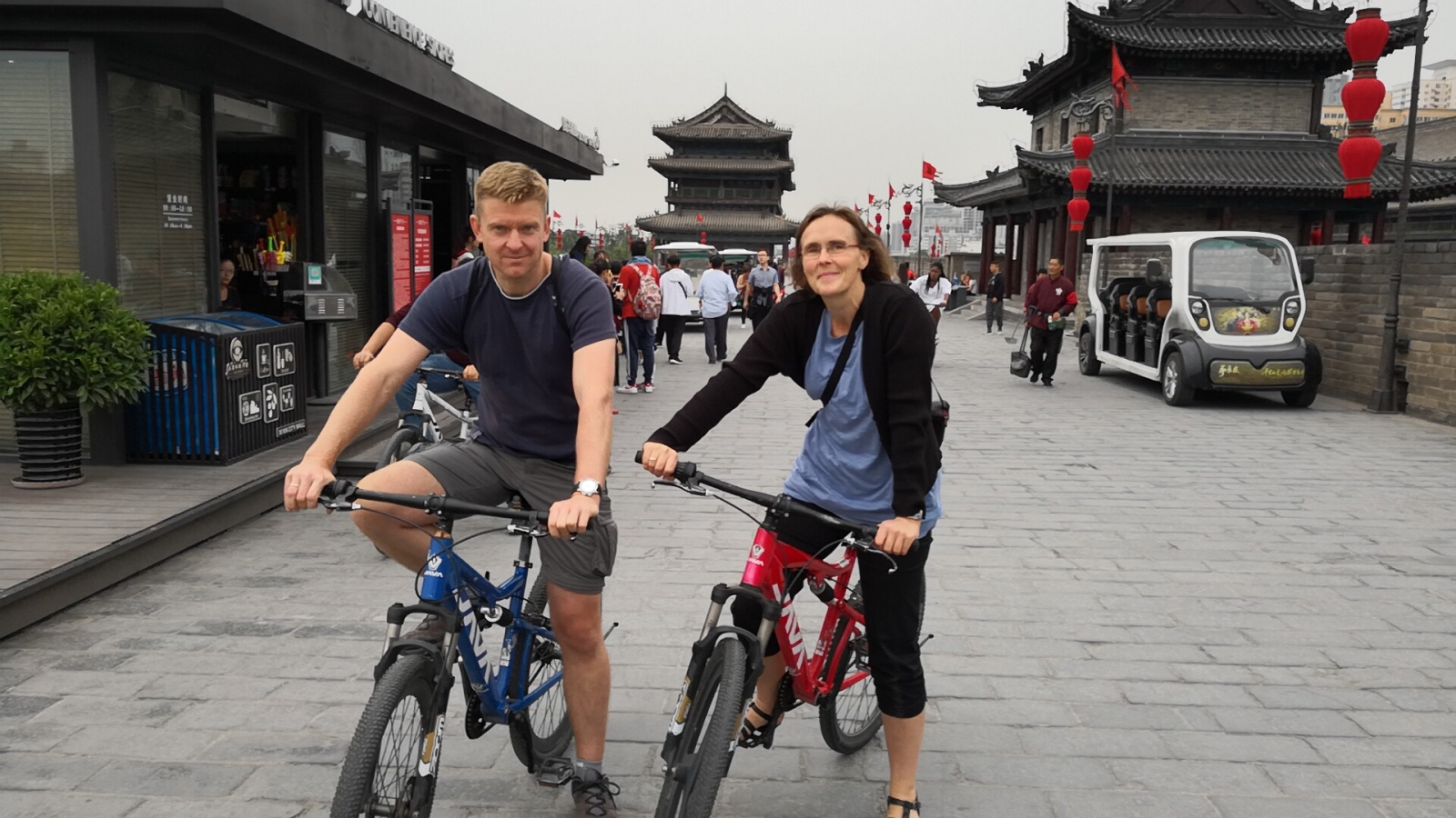 Tourists cycling along the ancient city wall in Xi'an