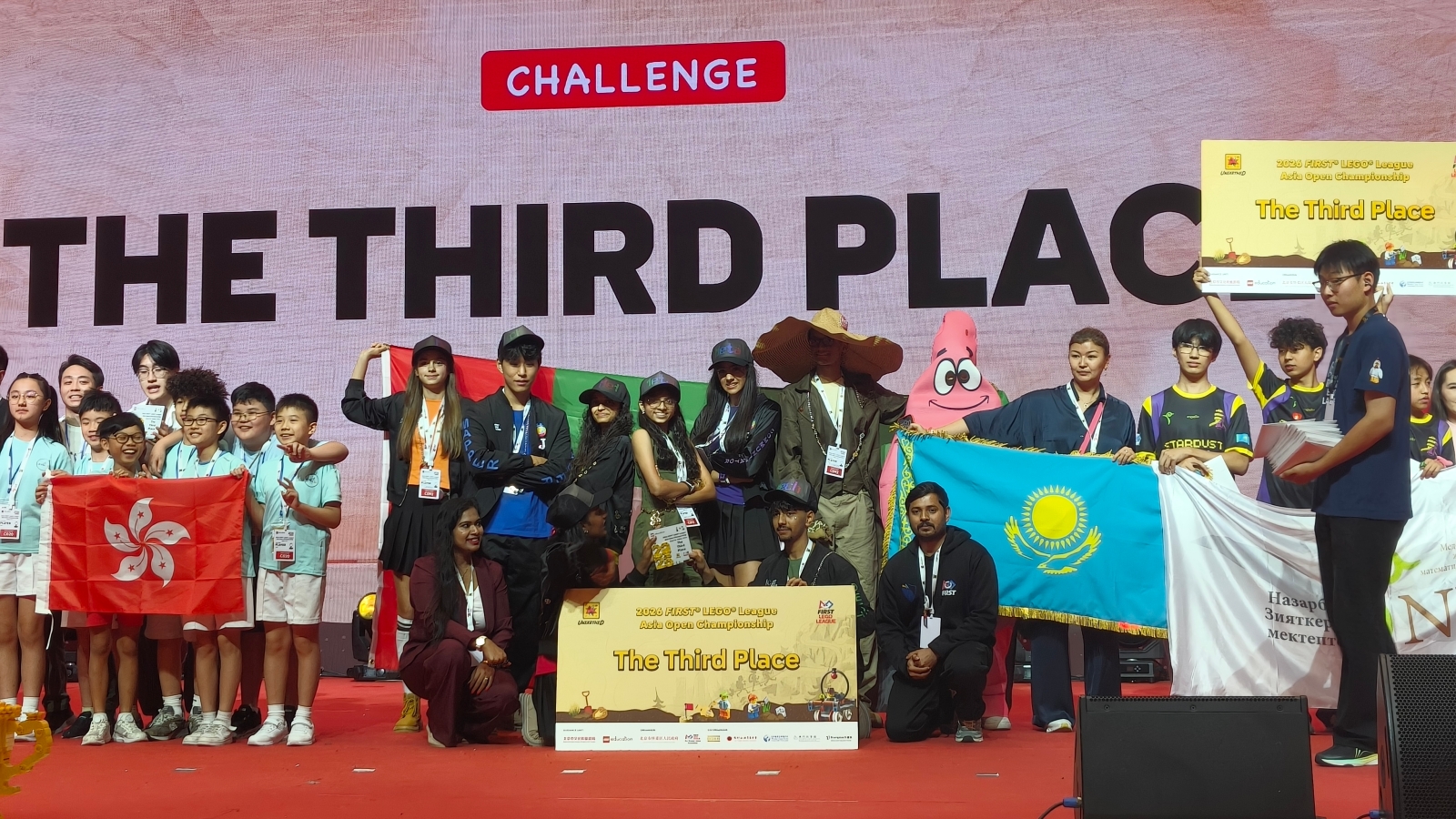 Third-place teams on stage at the 2026 FIRST LEGO League Asia Open Championship in Beijing